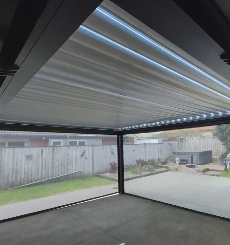 A patio cover transforms an open backyard into a private outdoor space