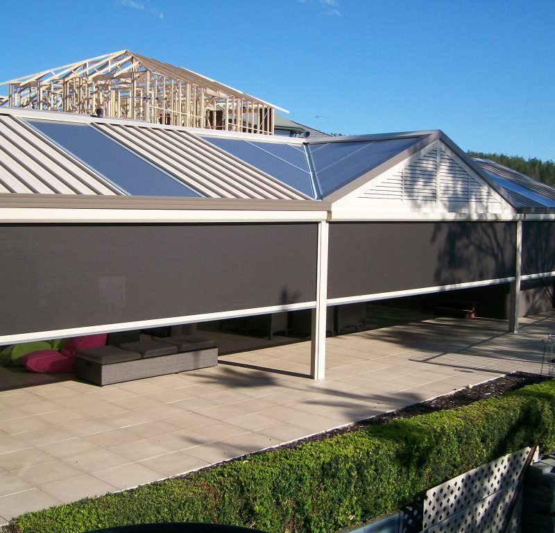 A patio cover transforms an open backyard into a private outdoor space