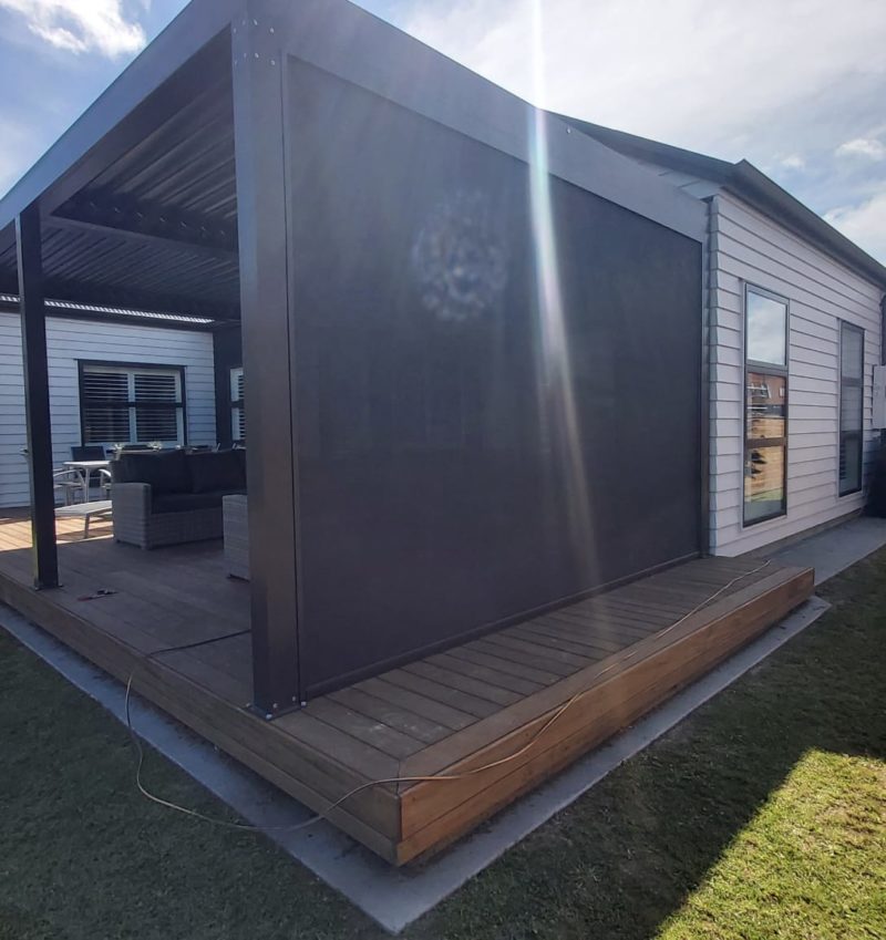 A patio cover transforms an open backyard into a private outdoor space